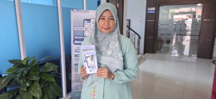 BERHASIL— Peserta JKN yang berhasil mengaktifkan kartu JKN dengan skema cicilan.