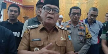 MASA TANGGAP DARURAT— Bupati Pasaman Barat Yulianto saat menyampaikan masa tanggap darurat bencana di daerah itu berakhir, Senin (29/12).