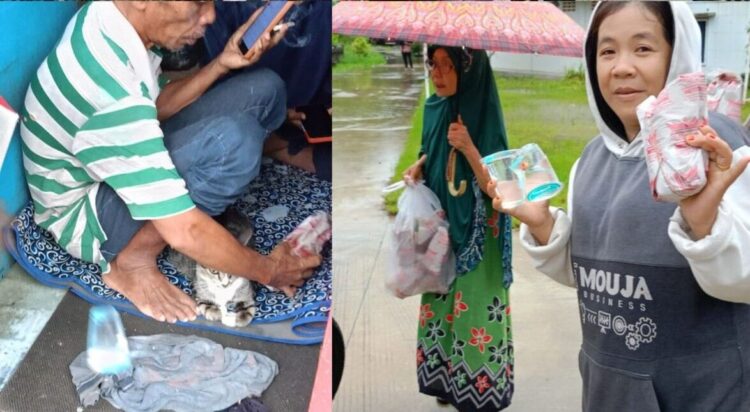 Warga terdampak banjir menikmati nasi bungkus yang dibagikan BRI RO Padang