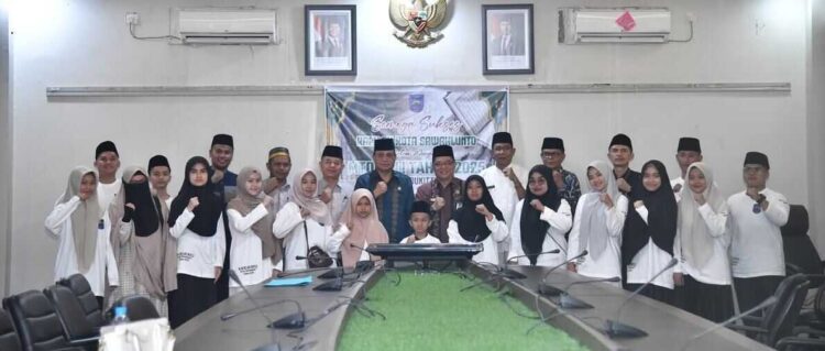Kafilah MTQ Sawahlunto Dilepas Menuju MTQ Nasional XII Sumbar 1 PELEPASAN KAFILAH— Sekda Sawahlunto Rovanly Abdams melepas para kafilah Musabaqah Tilawatil Qur’an (MTQ) Kota Sawahlunto menuju Kota Bukittinggi.