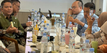 PAPARKAN—Kepala Perwakilan BI Provinsi Sumbar, Mohamad Abdul Madjid Ikram saat memaparkan perekonomian 2025 dan outlook perekonomian 2026.