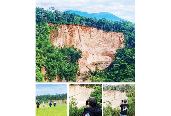 LONGSOR— Tebing Ngarai Sianok mengalami longsor akibat bencana hidrometeorologi yang melanda Kabupaten Agam.