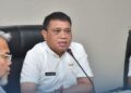 Sekda Sawahlunto Evaluasi Perkembangan Program KDMP 2 SAMBUTAN—Sekretaris Daerah Kota Sawahlunto Rovanly Abdams bnerikan sambutan saat rakor tentang perkembangan program Koperasi Desa Merah Putih (KDMP).
