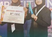 Harumkan Nama Padang Panjang, Dua Siswi SMAN 1 Raih Medali Perunggu di Malaysia